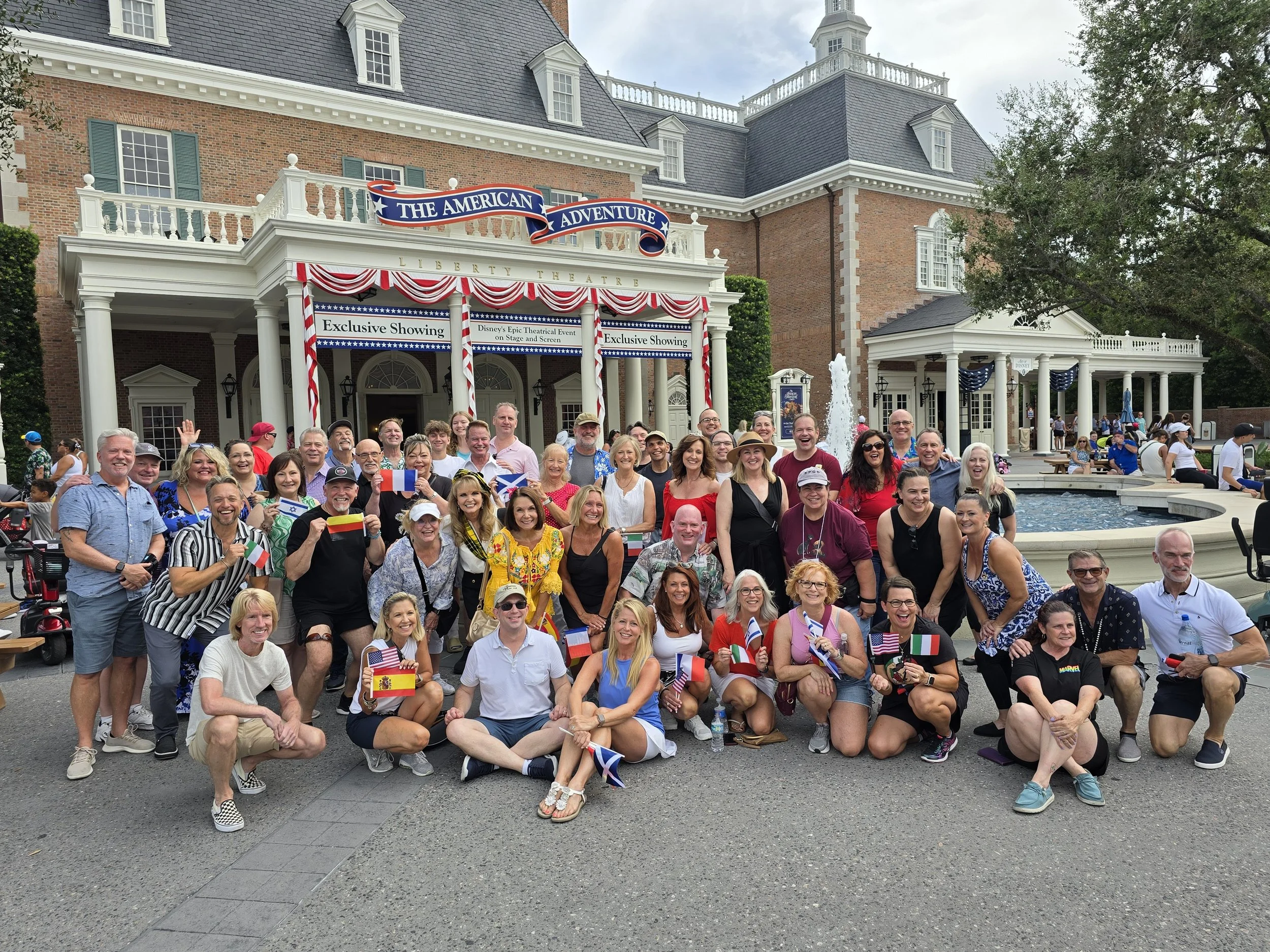 AACO alumni gathered in front of the American Adventure pavilion at Epcot, 2024